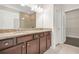 Bathroom with double vanity, granite countertop, and walk-in shower at 728 Lorimore Pass, Canton, GA 30115