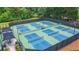 Overhead view of 6 well-maintained community pickleball courts with green and blue surface and black fencing at 728 Lorimore Pass, Canton, GA 30115