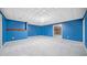 Spacious basement featuring blue walls, neutral carpet, recessed lighting and a large open floor plan at 1440 Boundary Blvd, Suwanee, GA 30024