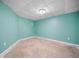Unfinished basement area featuring aqua walls and concrete flooring at 1440 Boundary Blvd, Suwanee, GA 30024