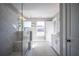 Bright bathroom featuring a glass shower, marble floors, and a stylish vanity with good natural lighting at 1741 Prospect Way, Conyers, GA 30094