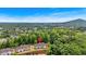 Aerial view of a charming neighborhood nestled in lush greenery, with a house pinpointed for its prime location at 2205 Hoskin Nw Ct # 9, Kennesaw, GA 30144