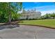 Beautiful clubhouse with white columns, well-manicured lawn, and curb appeal, inviting residents at 2205 Hoskin Nw Ct # 9, Kennesaw, GA 30144