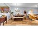 Open concept dining area with wood floors, chandelier and space for entertaining at 2205 Hoskin Nw Ct # 9, Kennesaw, GA 30144