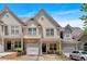 Charming townhome with stone accents, attached garage, and inviting front porch in a desirable community at 2205 Hoskin Nw Ct # 9, Kennesaw, GA 30144