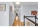 Spacious hallway with natural lighting and a staircase, connecting the different areas of the home at 2205 Hoskin Nw Ct # 9, Kennesaw, GA 30144