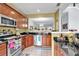 Modern kitchen featuring stainless steel appliances, granite countertops, and ample cabinet space for the home chef at 2205 Hoskin Nw Ct # 9, Kennesaw, GA 30144