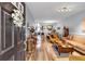 Open-concept floor plan with hardwood floors, a view into the dining area, and plenty of natural light at 2205 Hoskin Nw Ct # 9, Kennesaw, GA 30144