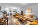 Bright and airy living room offers ample seating, wood floors, and tasteful decor, perfect for relaxation and entertaining at 2205 Hoskin Nw Ct # 9, Kennesaw, GA 30144