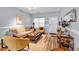 Cozy living room featuring comfortable seating, wood floors, and a welcoming atmosphere for relaxing with Gathering and friends at 2205 Hoskin Nw Ct # 9, Kennesaw, GA 30144