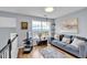 Cozy sitting area with comfortable seating and natural light, creating a tranquil space for relaxation and reading at 2205 Hoskin Nw Ct # 9, Kennesaw, GA 30144
