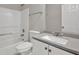 Bathroom with shower-tub combo, toilet, and a single sink vanity with gray countertop at 3885 Riverview Chase Blf, Ellenwood, GA 30294