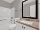 Bathroom with white vanity, stone countertops, and shower-tub combo at 3885 Riverview Chase Blf, Ellenwood, GA 30294