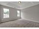 Bedroom with neutral walls, carpet, recessed lighting, and natural light streaming through windows at 3885 Riverview Chase Blf, Ellenwood, GA 30294