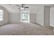 Spacious bedroom with vaulted ceiling, carpet flooring and bright windows at 3885 Riverview Chase Blf, Ellenwood, GA 30294