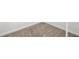 Clean carpet in neutral color with white baseboards and trim offers a blank canvas for decorating at 3885 Riverview Chase Blf, Ellenwood, GA 30294