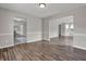 View of the living room showing the seamless access to other areas of the home at 3885 Riverview Chase Blf, Ellenwood, GA 30294