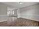 The living room showcases hardwood floors and neutral wall tones at 3885 Riverview Chase Blf, Ellenwood, GA 30294