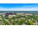 An aerial view showcases the home's prime location near commercial buildings and beautiful landscaping at 4 Mount Vernon Cir, Atlanta, GA 30338