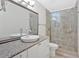 Bathroom featuring a glass enclosed tile shower, decorative tile floor border, and granite vanity at 4 Mount Vernon Cir, Atlanta, GA 30338