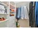 Walk-in closet with custom shelving and ample storage space for shoes and clothing at 4 Mount Vernon Cir, Atlanta, GA 30338