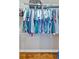 Walk-in closet with custom shelving and ample storage space for hanging clothes at 4 Mount Vernon Cir, Atlanta, GA 30338