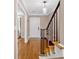 Bright entryway with hardwood floors, staircase, and a view into other rooms of the home at 4 Mount Vernon Cir, Atlanta, GA 30338