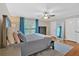 Bright bedroom with hardwood floors, a ceiling fan, and two closets at 4 Mount Vernon Cir, Atlanta, GA 30338