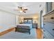 Bedroom features a ceiling fan, closet, two nightstands and dark wood flooring at 4 Mount Vernon Cir, Atlanta, GA 30338
