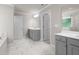 Elegant bathroom with double vanities, soaking tub, and a separate glass-enclosed shower at 741 Cams Crk, Mcdonough, GA 30253