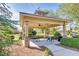 Community gazebo featuring a ceiling fan, outdoor seating, and professional landscaping at 741 Cams Crk, Mcdonough, GA 30253