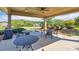 Community patio area with ceiling fans, tables, and chairs, ideal for gatherings and socializing at 741 Cams Crk, Mcdonough, GA 30253
