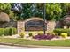 The Estates at Cameron Manor community signage with professional landscaping at 741 Cams Crk, Mcdonough, GA 30253