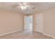 Bedroom featuring a ceiling fan, neutral paint, and light wood floors at 4235 Crestwood Bend Cir, Buford, GA 30518