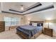 Cozy bedroom with a trey ceiling, and plush carpet providing a comfortable retreat at 4235 Crestwood Bend Cir, Buford, GA 30518