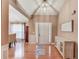 Spacious foyer featuring hardwood floors and designer accents at 4235 Crestwood Bend Cir, Buford, GA 30518