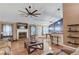 Spacious living room featuring a fireplace, bar seating and open layout at 4235 Crestwood Bend Cir, Buford, GA 30518