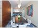 Elegant conference room with a long table, comfortable chairs, and a modern chandelier at 4561 Olde Perimeter Way # 608, Dunwoody, GA 30346