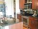 Well-equipped kitchen featuring stainless steel appliances and granite countertops at 4561 Olde Perimeter Way # 608, Dunwoody, GA 30346