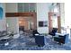 Comfortable lobby area with plenty of seating and a large screen tv, great for gathering with friends and neighbors at 4561 Olde Perimeter Way # 608, Dunwoody, GA 30346