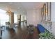 Modern lobby with decorative lighting, comfortable seating, and sleek hardwood floors at 4561 Olde Perimeter Way # 608, Dunwoody, GA 30346