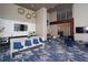 Chic lobby with modern fixtures, a convenient breakfast bar with blue chairs, and a comfortable resident lounge at 4561 Olde Perimeter Way # 608, Dunwoody, GA 30346