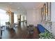 The lobby is modern and spacious with comfortable seating, hardwood floors, and designer lighting at 4561 Olde Perimeter Way # 608, Dunwoody, GA 30346