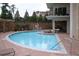 Inviting outdoor pool area with comfortable lounge chairs and lush landscaping, creating a relaxing retreat for residents at 4561 Olde Perimeter Way # 608, Dunwoody, GA 30346