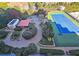 Enjoy an outdoor oasis with a beautiful tennis court, lounge area, and manicured landscaping at 4561 Olde Perimeter Way # 608, Dunwoody, GA 30346