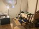 Bedroom with four poster bed, desk, and a window at 6354 Shannon Pkwy # 26C, Union City, GA 30291