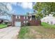 Charming two-story brick home with a front porch, well-maintained lawn, and inviting curb appeal at 1338 Georgia Ave, Atlanta, GA 30344