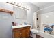 Bathroom featuring a shower with accessibility features and a wood vanity at 160 Northside Ave, Dallas, GA 30157