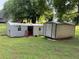 Two storage sheds provide backyard storage at 1791 Fairview Sw Dr, Austell, GA 30106
