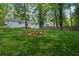 Expansive backyard with lush green lawn and mature trees surrounding the property at 2595 Elkhorn Dr, Decatur, GA 30034